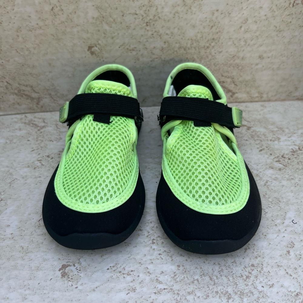 Neon green and black toddlers size 9/10 swim water shoes.
